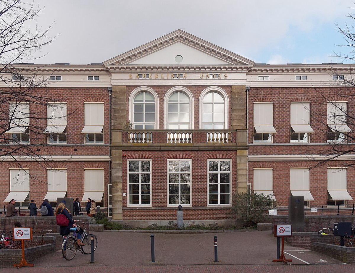 The Kamerlingh Onnes Laboratory building at Leiden University: a red-brick facade with a white pediment and the name Kamerlingh Onnes in gold letters