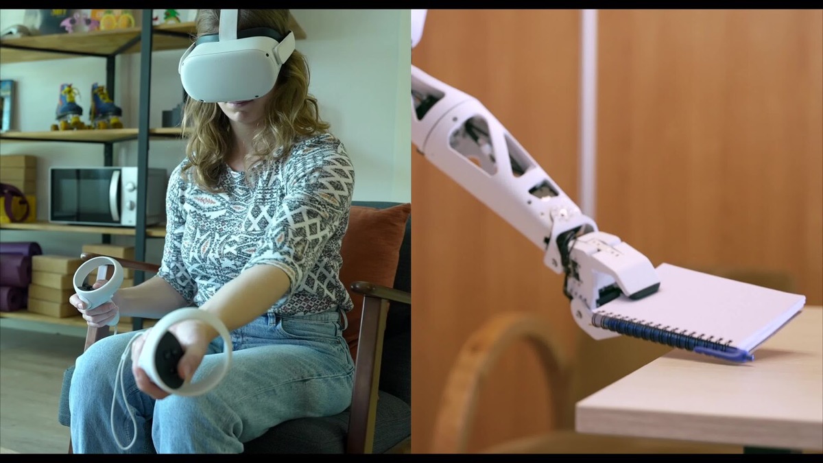 A person wearing a virtual reality headset and holding controllers on the left, and a white robot arm holding a notebook on the right