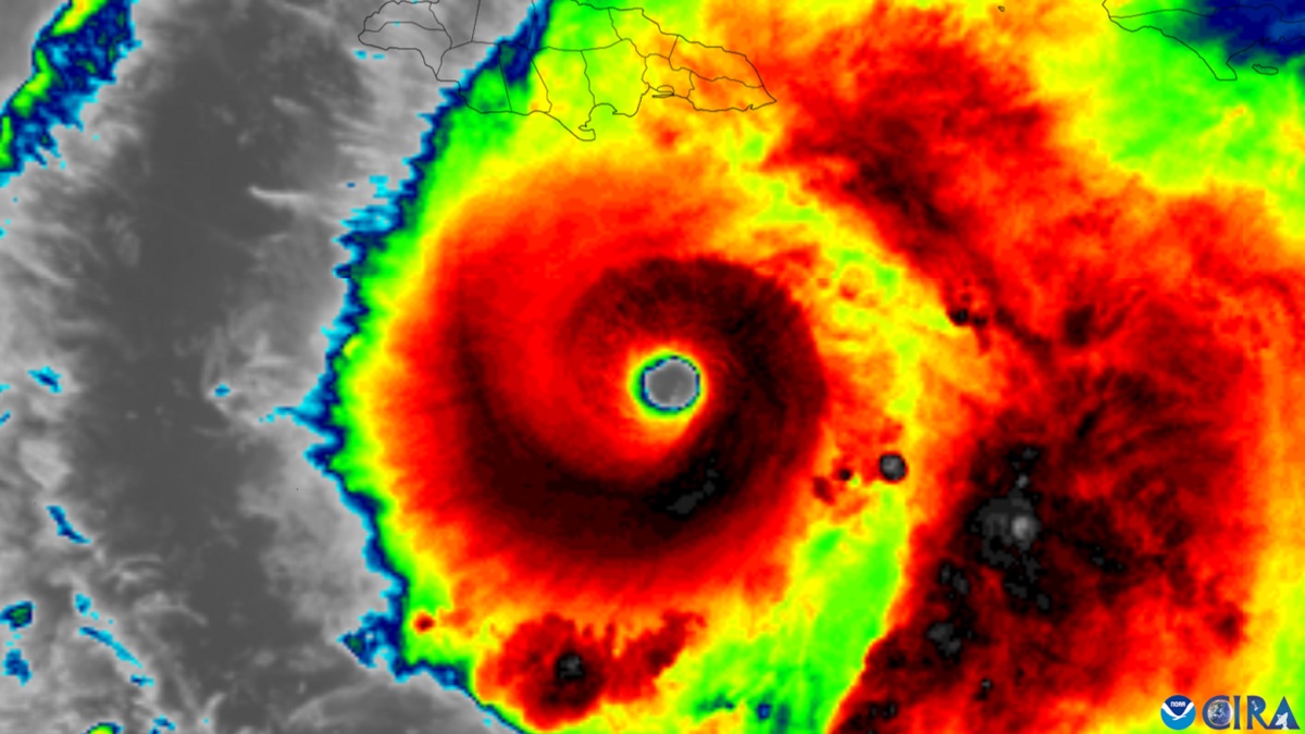 Infrared satellite image of Hurricane Melissa with a small, sharply defined eye surrounded by red and black cloud tops